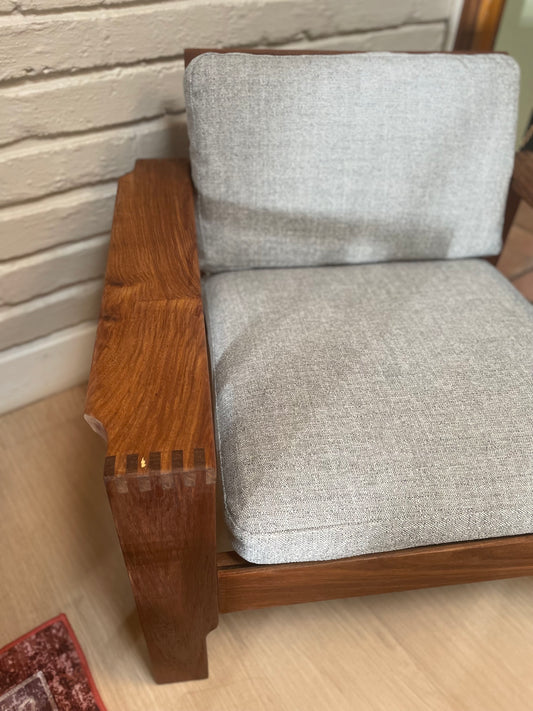 A pair of Kiaat armchairs, inspired by the iconic Kallenbach