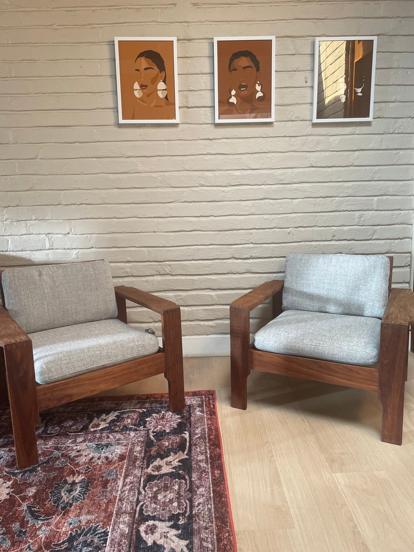 A pair of Kiaat armchairs, inspired by the iconic Kallenbach