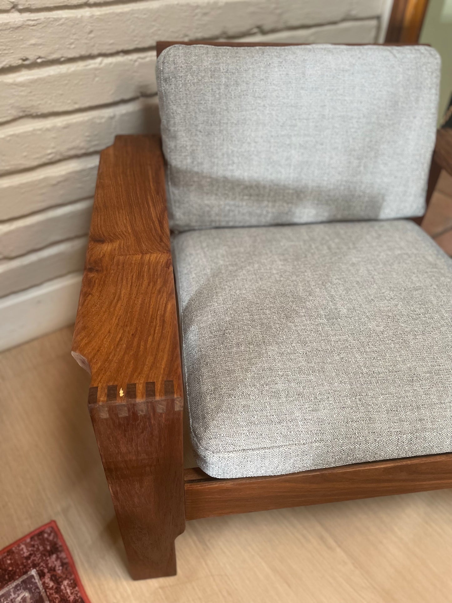 A pair of Kiaat armchairs, inspired by the iconic Kallenbach