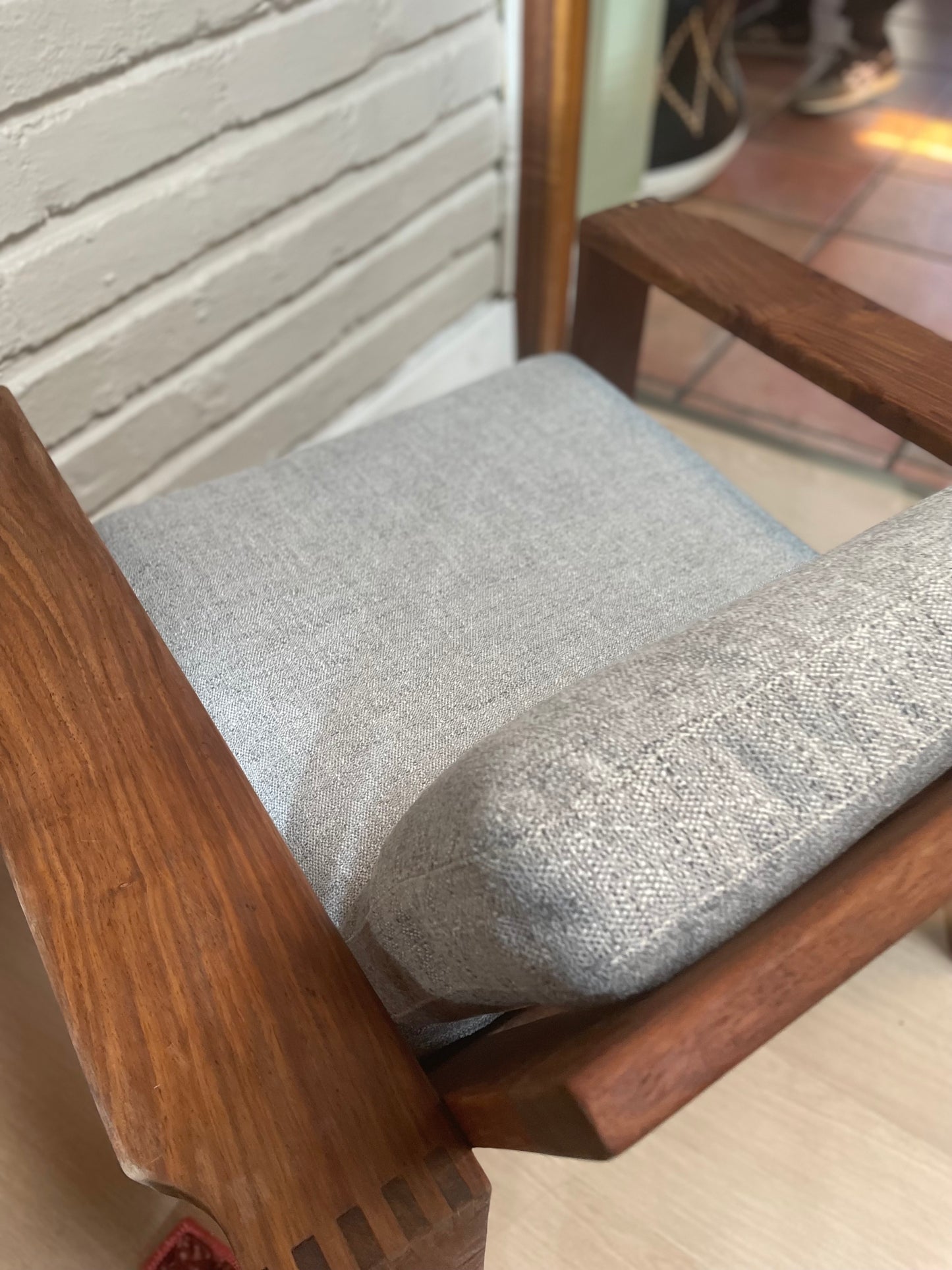 A pair of Kiaat armchairs, inspired by the iconic Kallenbach